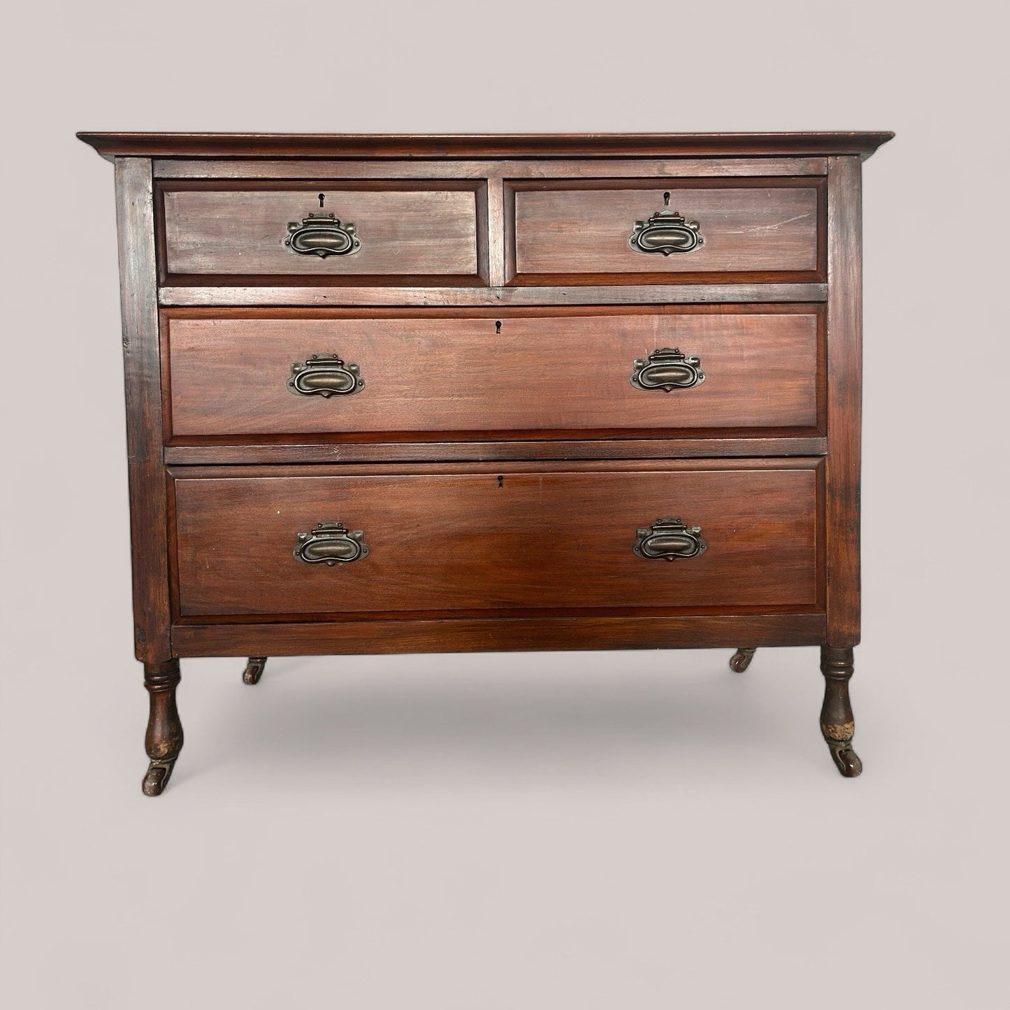 Edwardian Mahogany Chest of Drawers on Ceramic Castors c.1910