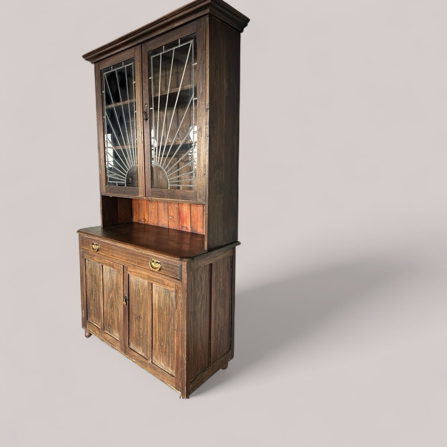 1930s dresser with art deco sun motif