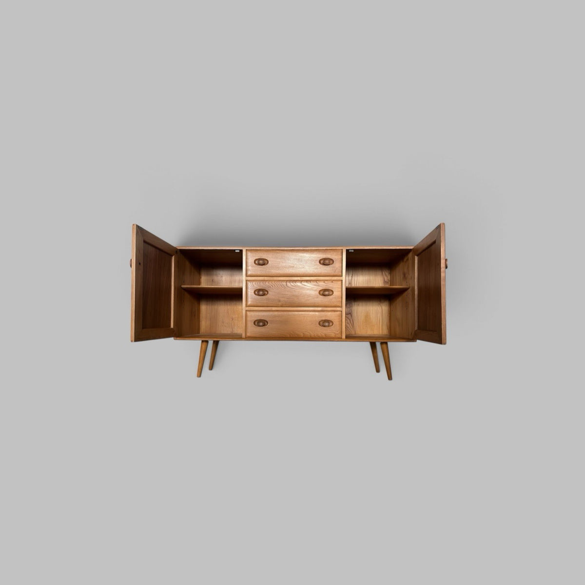 Vintage Ercol Solid Elm Windsor Sideboard on tapered legs.