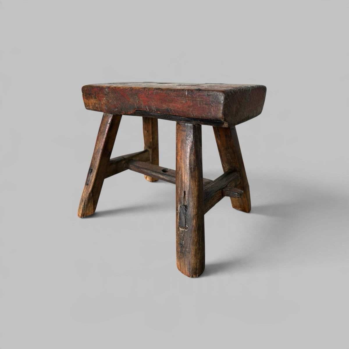 Rustic Elm Stool with Red Paint Patina