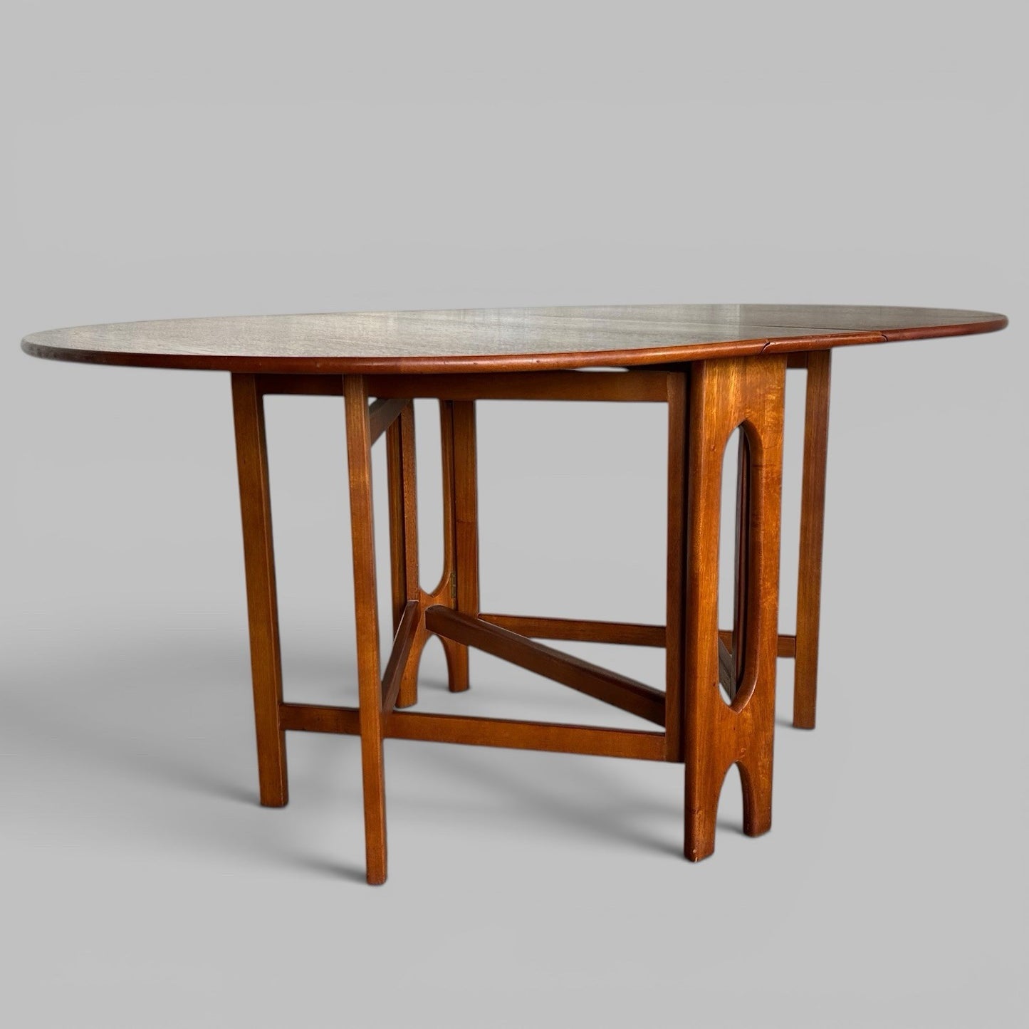 Mid Century Teak Oval Drop Leaf Dining Table by A.H. McIntosh