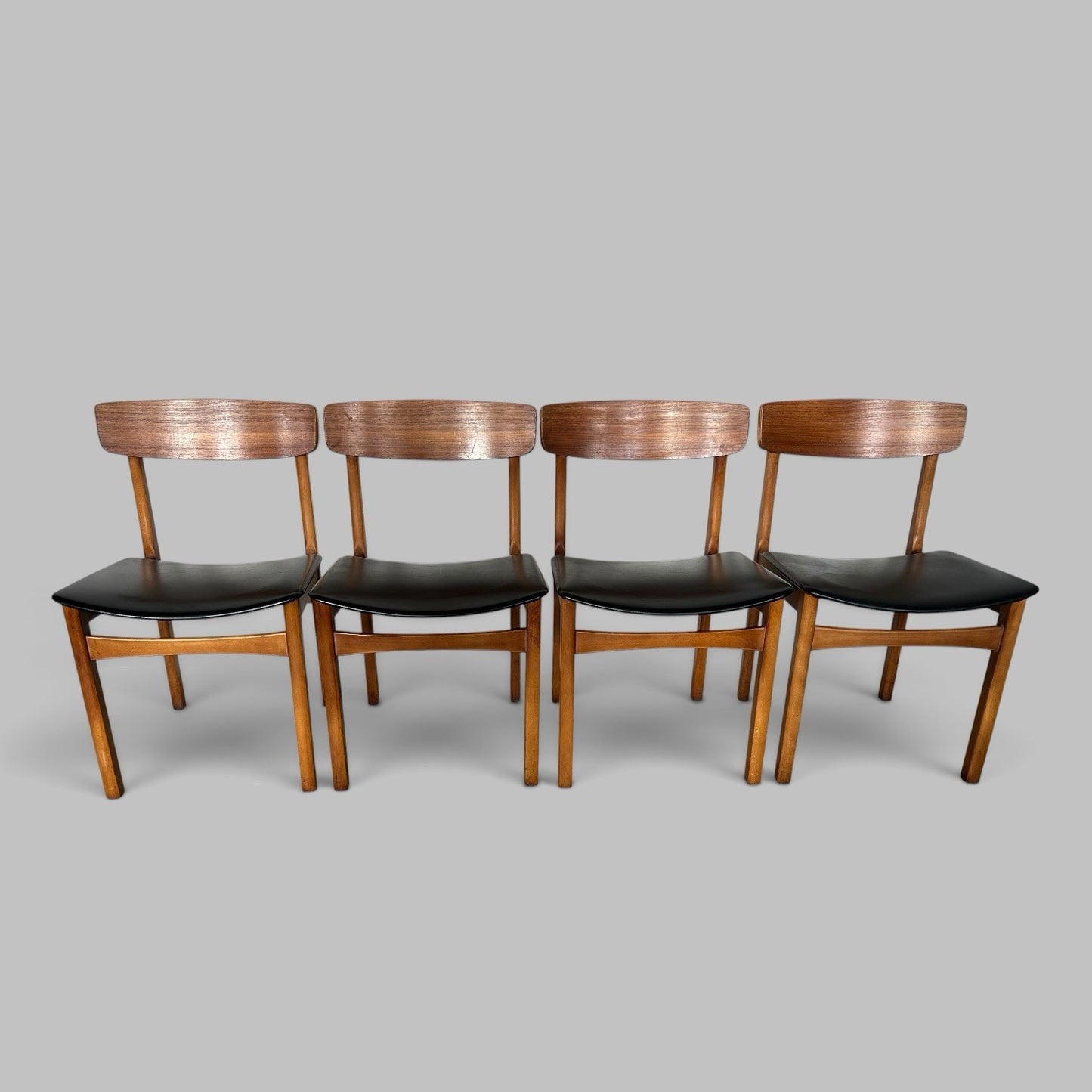 Vintage Teak Dining Chairs with Black Vinyl Seats – Set of Four