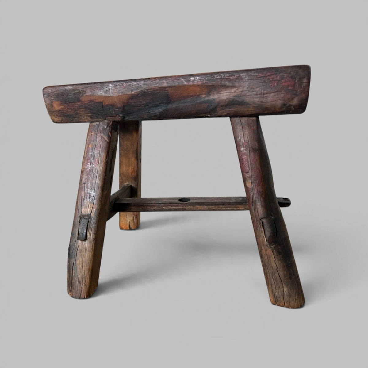 Rustic Elm Stool with Red Paint Patina