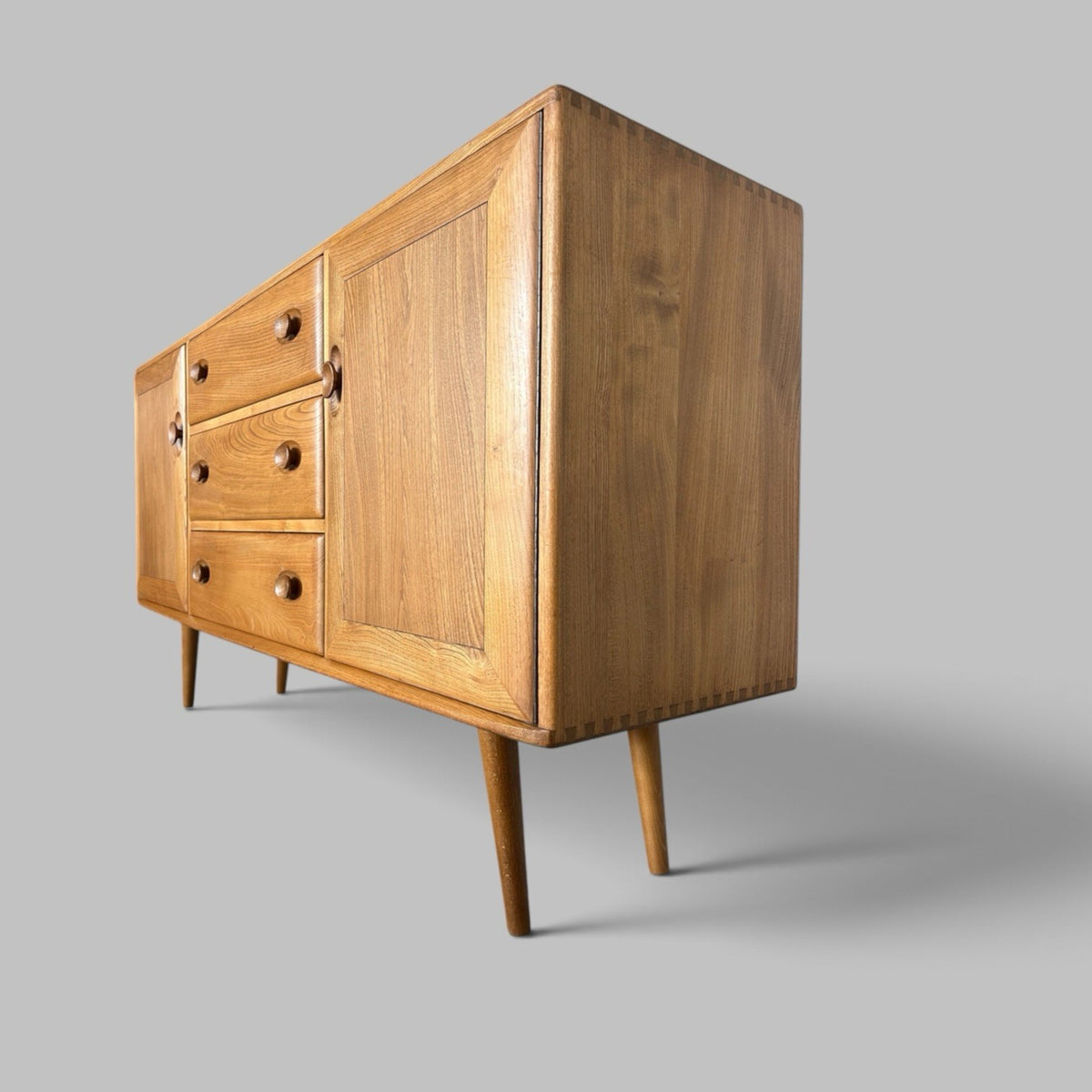 Vintage Ercol Solid Elm Windsor Sideboard on tapered legs.
