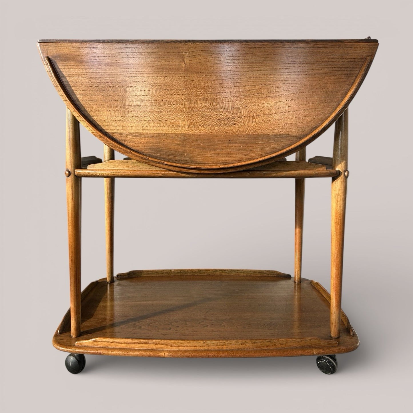 Mid-century Ercol metamorphic hostess trolley with drop-leaf top