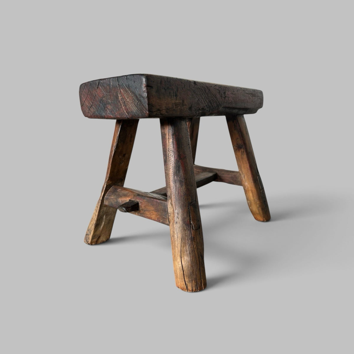 Rustic Elm Stool with Red Paint Patina