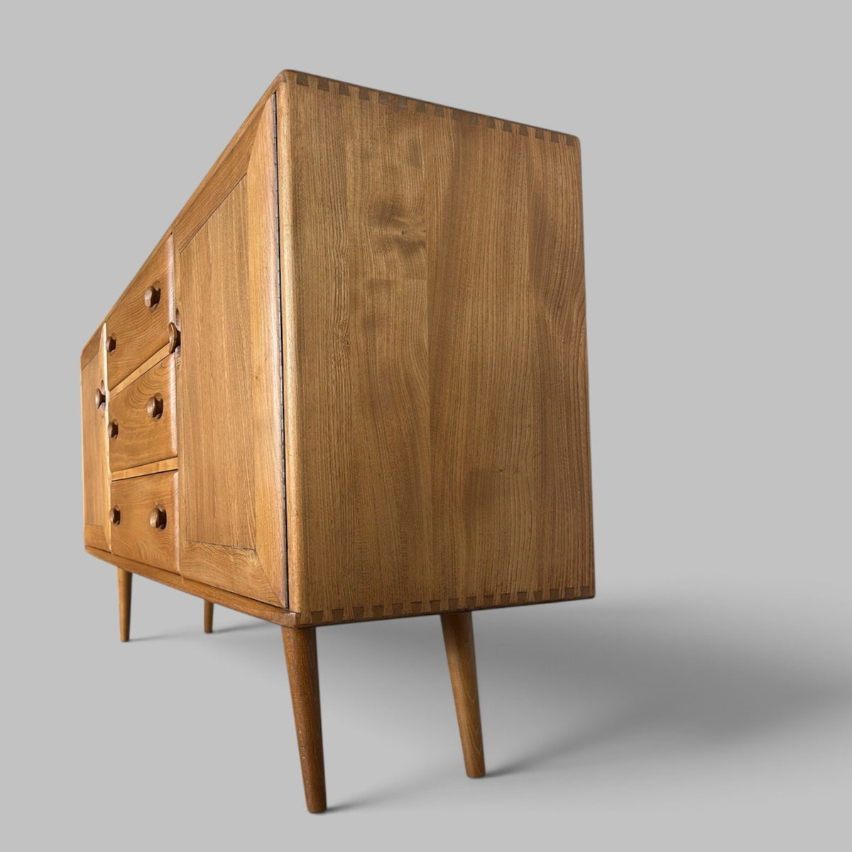 Vintage Ercol Solid Elm Windsor Sideboard on tapered legs.