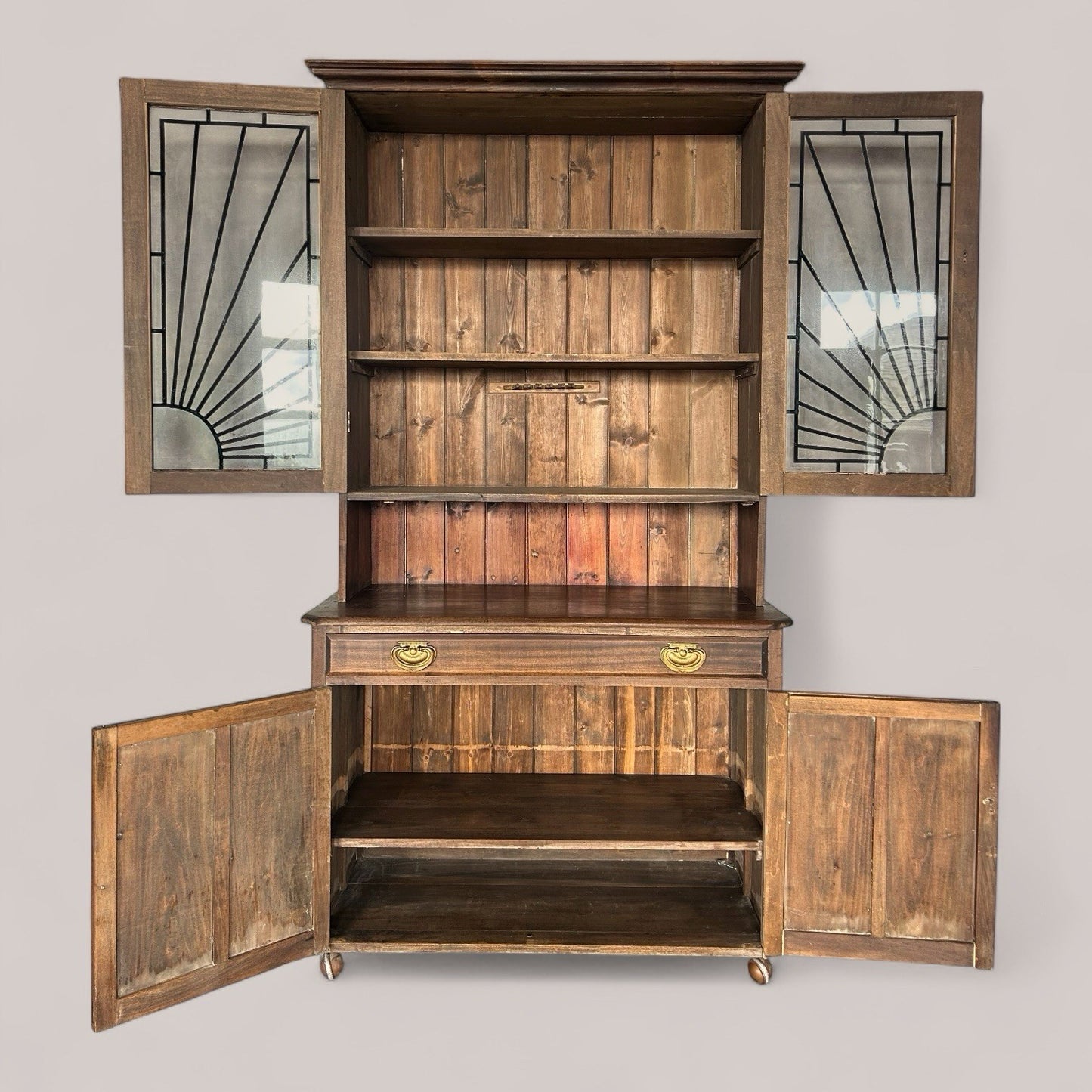 1930s dresser with art deco sun motif