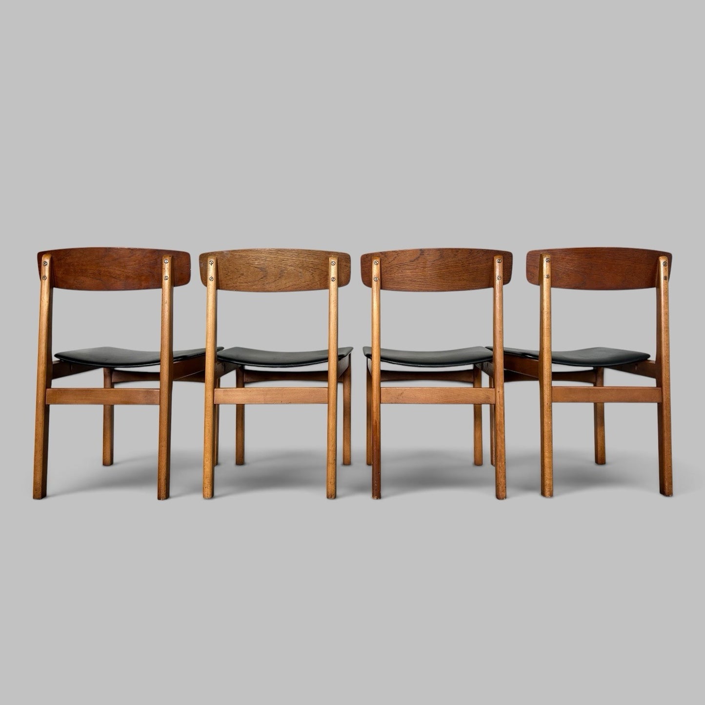 Vintage Teak Dining Chairs with Black Vinyl Seats – Set of Four