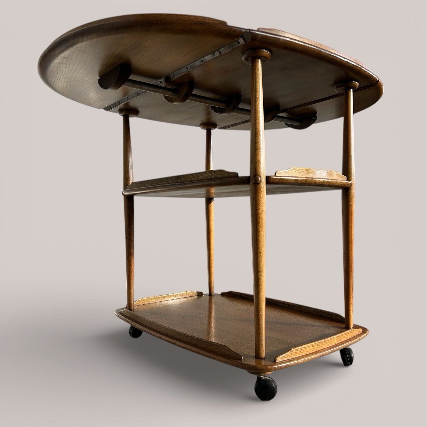 Mid-century Ercol metamorphic hostess trolley with drop-leaf top