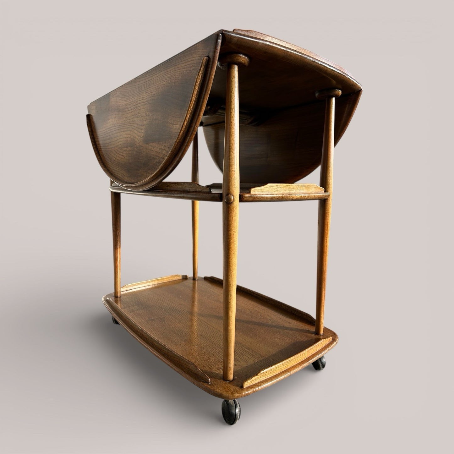 Mid-century Ercol metamorphic hostess trolley with drop-leaf top