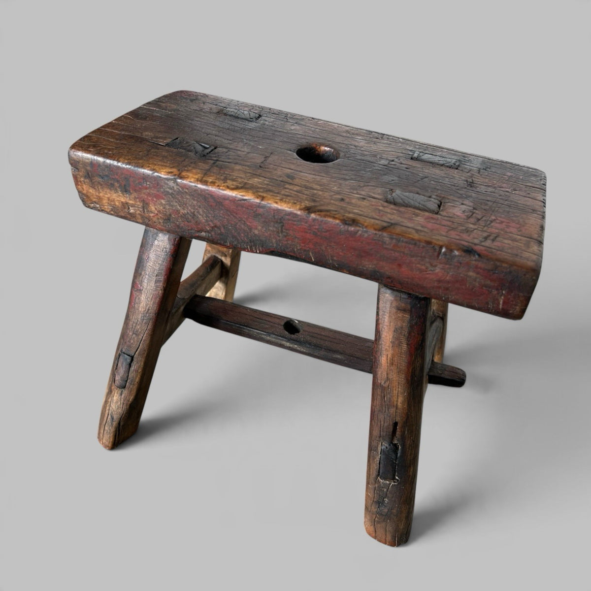 Rustic Elm Stool with Red Paint Patina