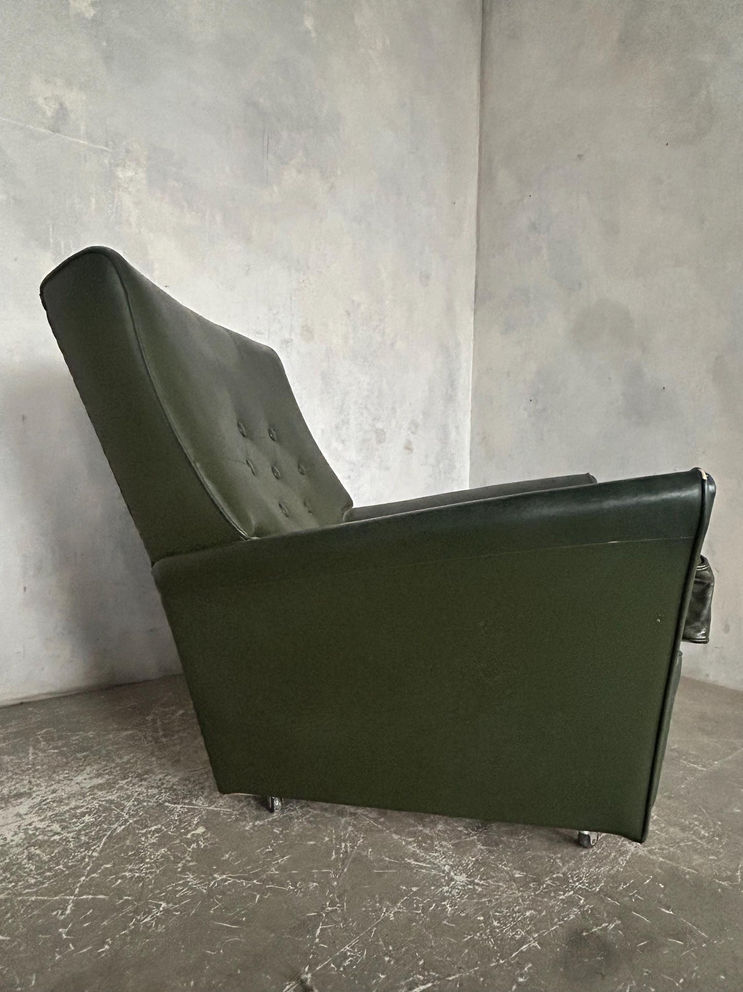 1960s green leatherette armchair