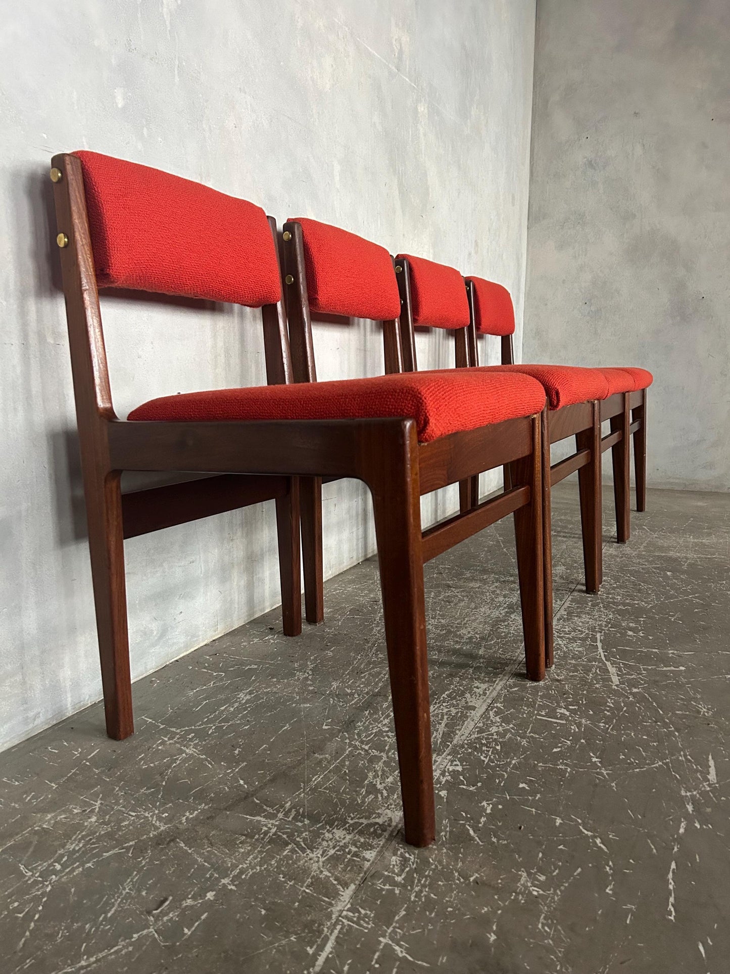 vintage midcentury teak dining chairs with red / burnt orange fabric to seat pads