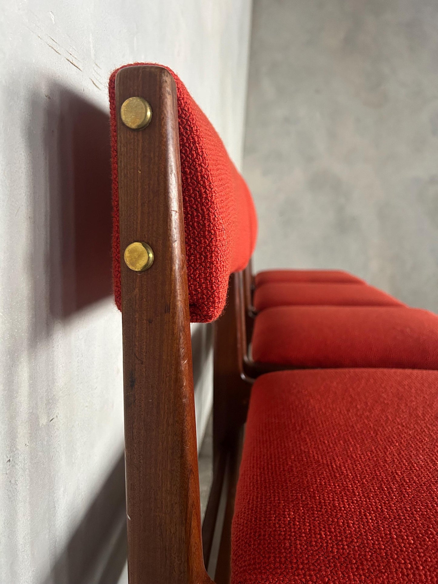 vintage midcentury teak dining chairs with red / burnt orange fabric to seat pads